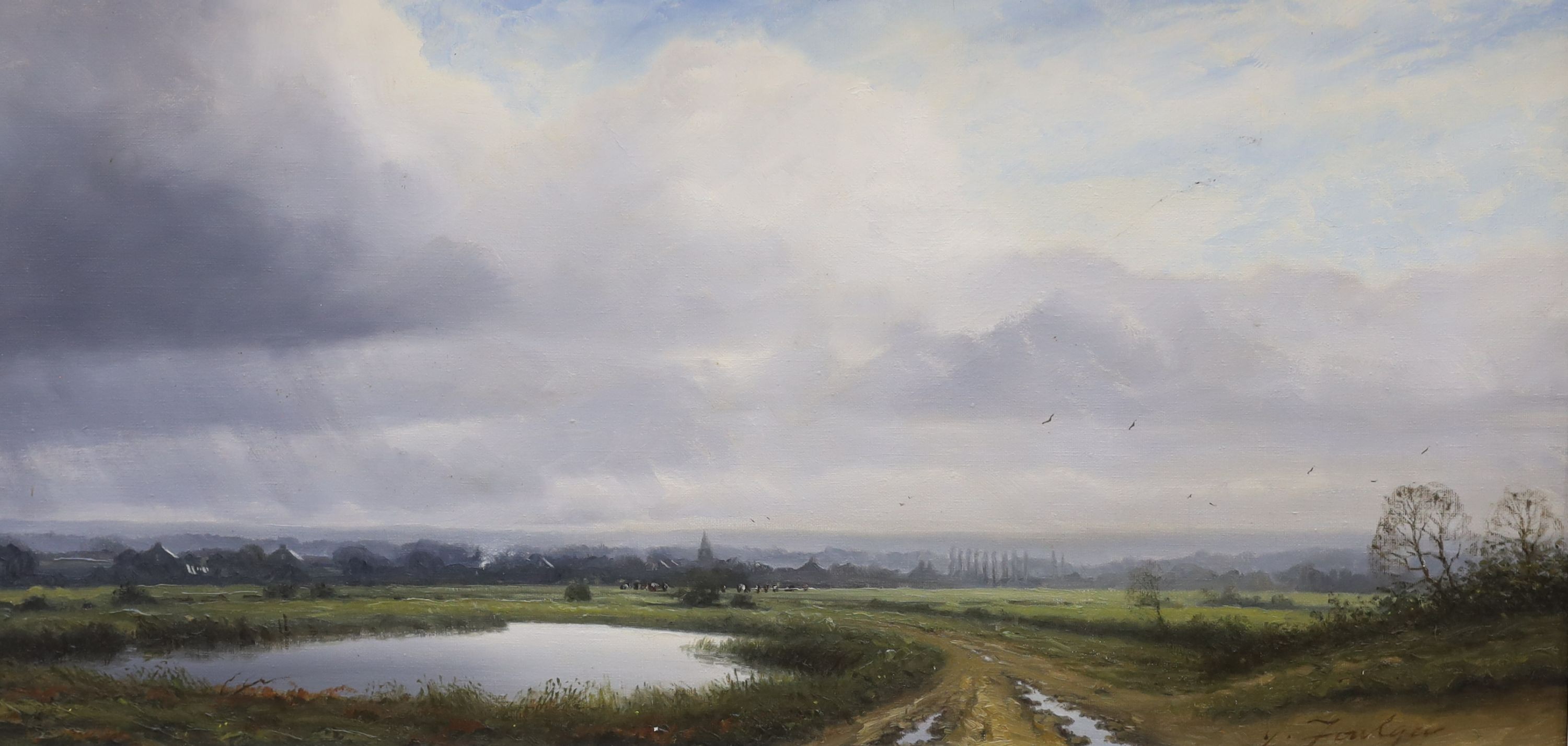 John Foulger (1943-2007), oil on canvas, Open riverscape with cattle and church in the distance, indistinctly signed, 40 x 80cm